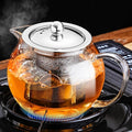 PARACITY Glass Teapot for Stovetop, 50 oz Clear Tea Kettle with Infuser | Removable 18/8 stainless steel strainer brews loose leaf, herbal and blooming teas; borosilicate body suits microwave use