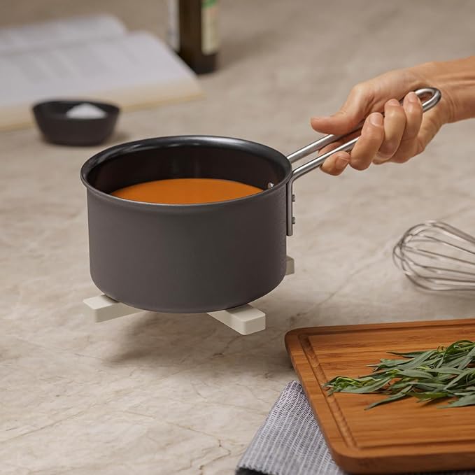 EVA SOLO | 2 Magnetic Trivets | Silicone-Coated Nylon with Built-in Magnets | Dishwasher-Safe | Placed Either Crossways or Divided in 2 | Danish Design, Functionality & Quality | Black